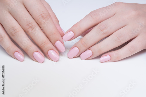 Amazing natural nails. Women s hands with clean manicure. Gel polish applied.