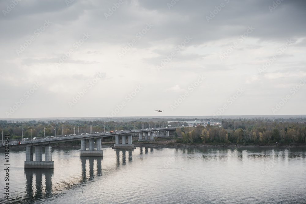 Naklejka premium The bridge through the river. Bolshoy Bridge through the river. Krasivy Bridge through the river.
