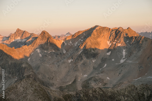 mountain ranges with snow in the sunlight at dusk or dawn in the Caucasus