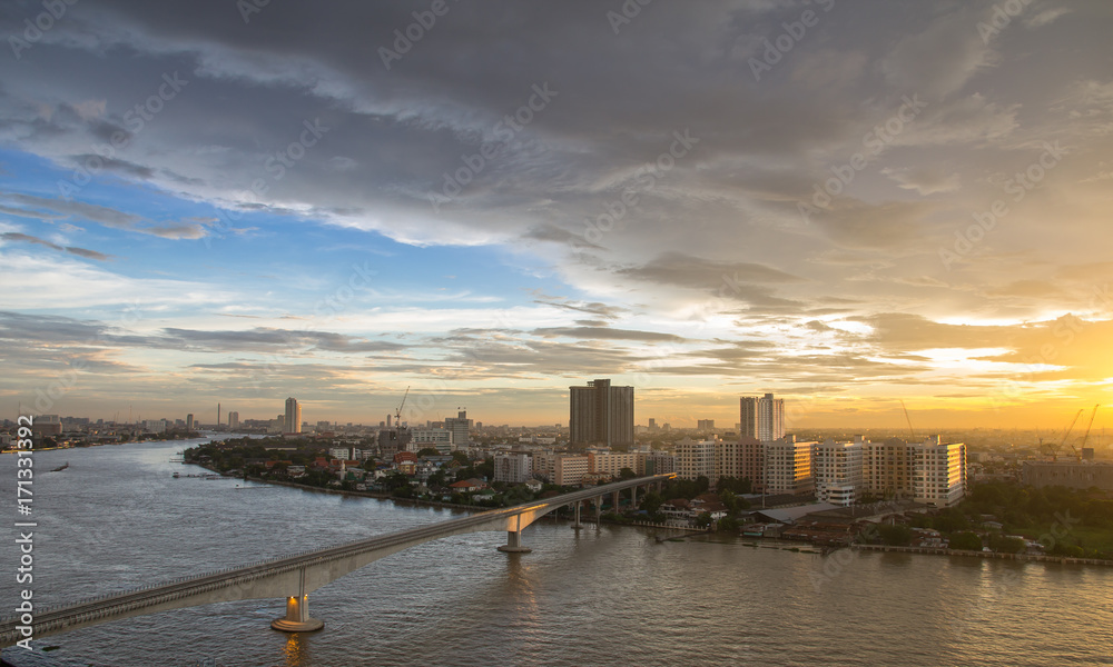 Landscape view of Bangkok with Chao Phraya river and sunset in evening, Bangkok Thailand	