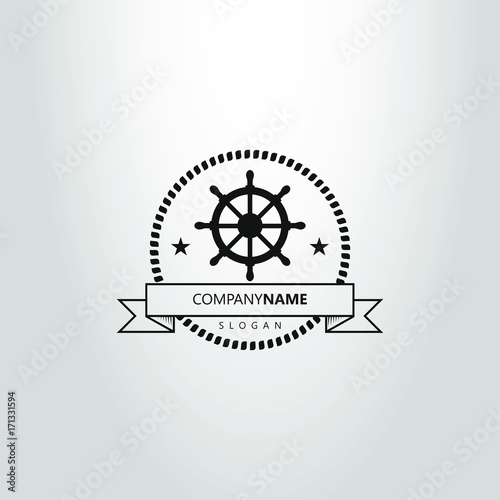 black and white steering wheel logo in frame