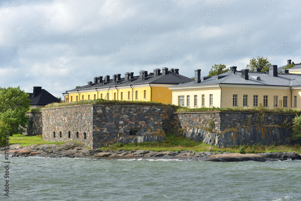 Fototapeta premium Suomenlinna (Sveaborg) fortress. Constructing began in 1748. Unapproachable Fortress Wall of Pikku-Musta island, Finnish naval academy
