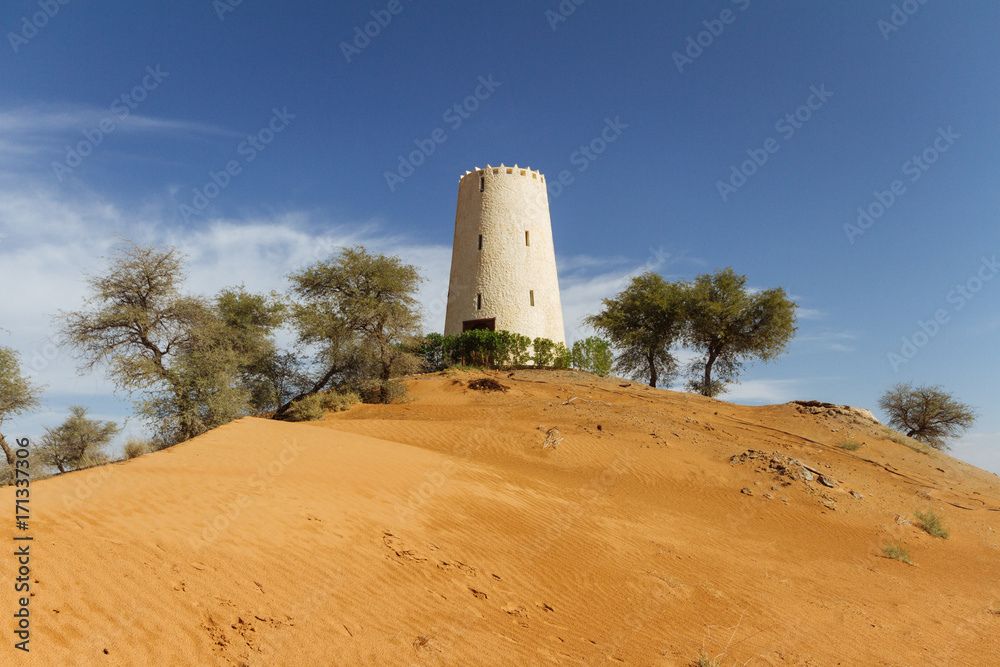 Watch tower on the sand dune that surrounding with trees at Abu Dhabi, UAE. Watch tower on the sand dune that surrounding with trees at Abu Dhabi, UAE.