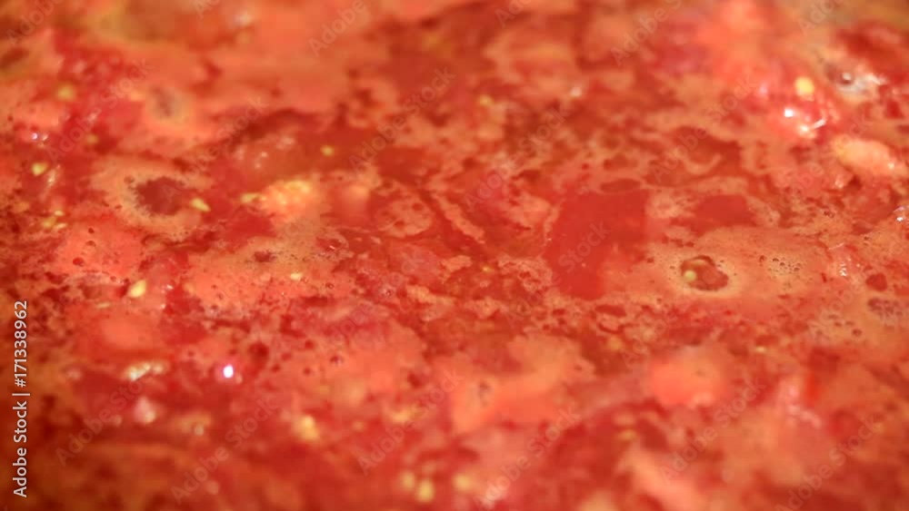 Cooking delicious tomato sauce closeup Cooking delicious tomato sauce closeup