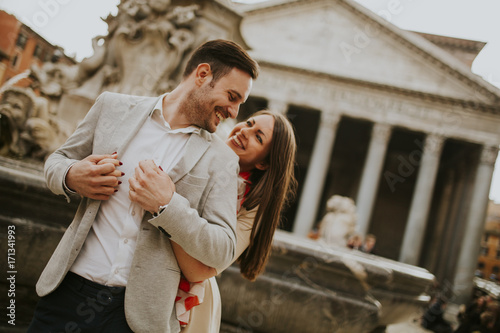 Photography Happy loving couple, man and woman traveling on holidays in Rome, Italy