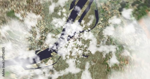 4K - Zoom out earth (through clouds to the space)