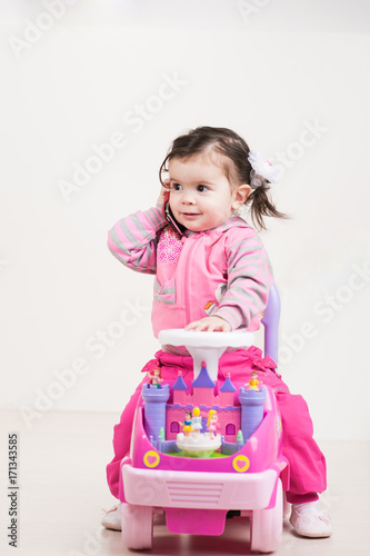 Little cute girl play indoor.