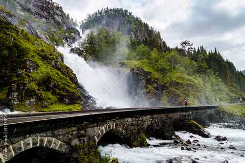 Fototapeta Naklejka Na Ścianę i Meble -  Powerful waterfall next to the road in Norway,