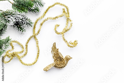 bird toys to decorate christmas tree for new year celebration with fur tree branches on white background top veiw mockup