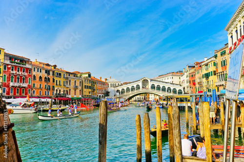 View of the historical gondolas rowing on the Grand Canal in Venice. photo