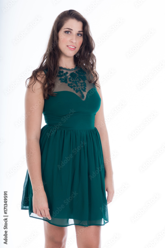 beautiful smiling young girl with long black hair in green dress,on white background beautiful smiling young girl with long black hair in green dress,on white background