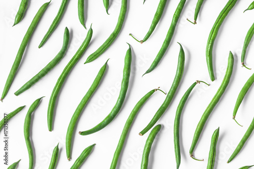 Green beans overhead closeup group isolated on white background in studio