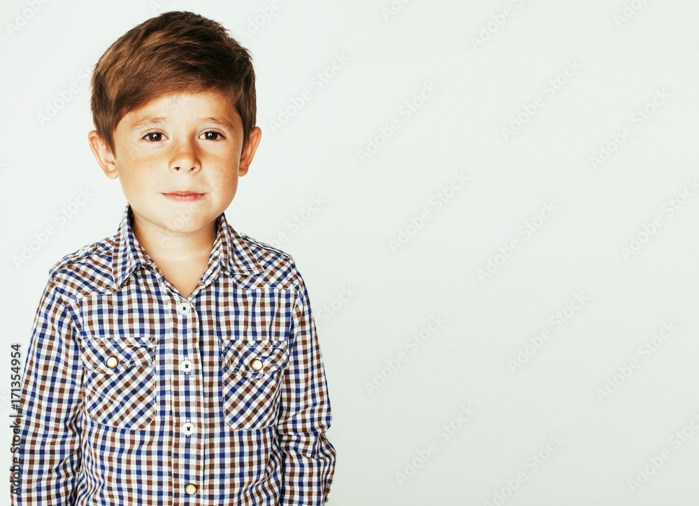 young pretty little cute boy kid wondering, posing emotional fac young pretty little cute boy kid wondering, posing emotional fac