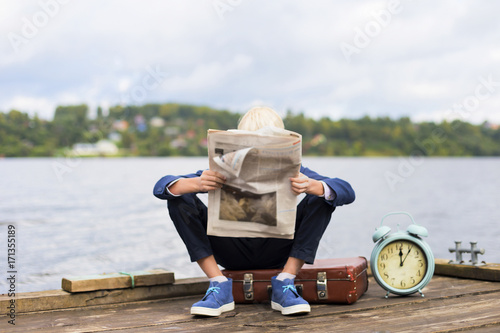 boy with newspaper
