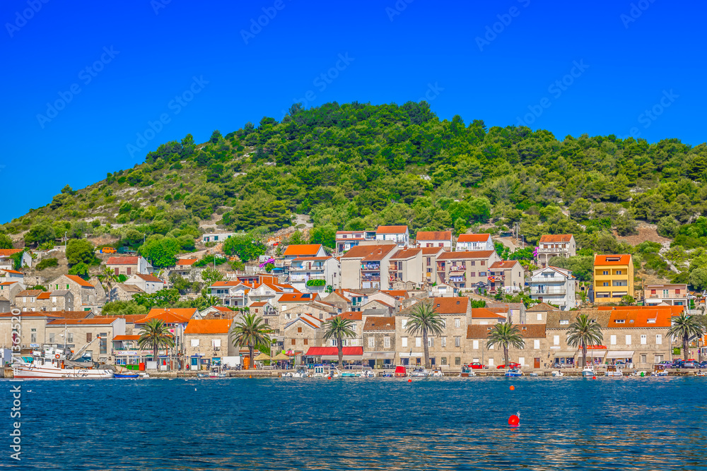 Naklejka premium Vis island summer landscape. / Seafront view at picturesque ancient village on Island Vis, summertime in Croatia, Europe.