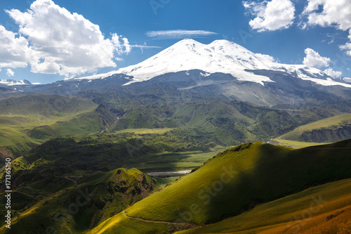 Elbrus And Green Hills At Sunny Summer Day. Elbrus Region, North Caucasus, Russia