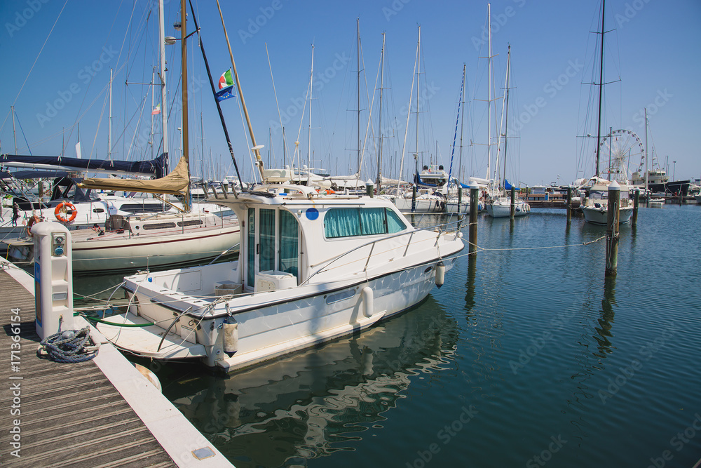 Yachts in the port waiting. Rimini, Italy. Yachts in the port waiting. Rimini, Italy.