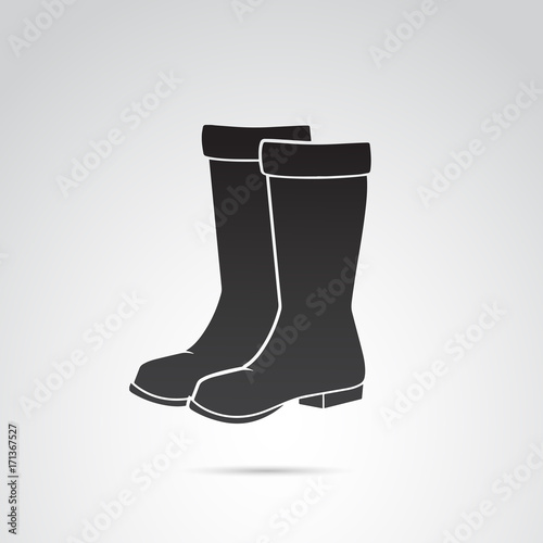 Rubber boots vector icon.