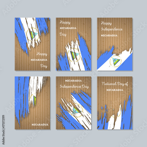 Nicaragua Patriotic Cards for National Day. Expressive Brush Stroke in National Flag Colors on kraft paper background. Nicaragua Patriotic Vector Greeting Card.