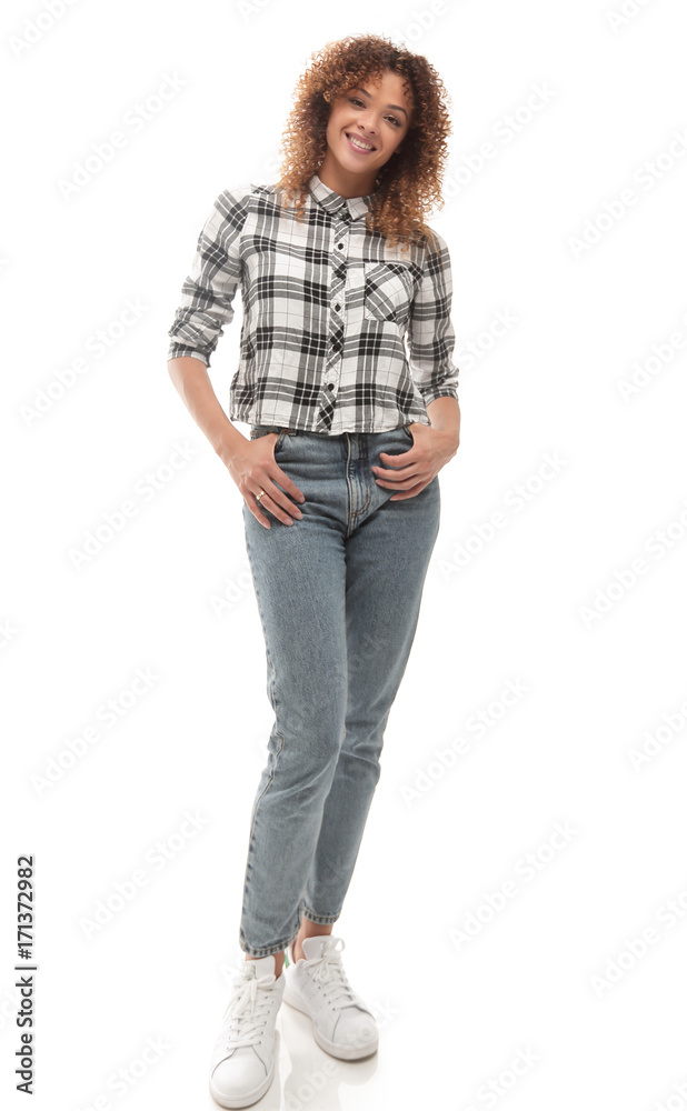 stylish young woman in plaid shirt and jeans.