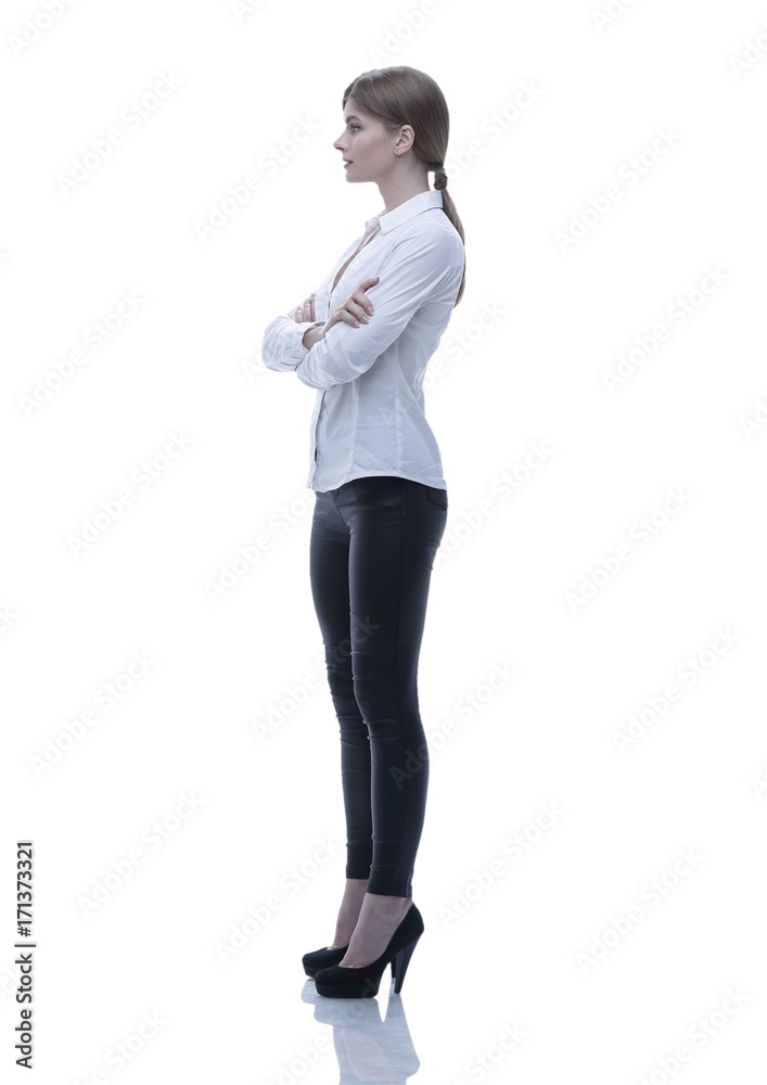 side view. in full growth.portrait of a confident young woman side view. in full growth.portrait of a confident young woman