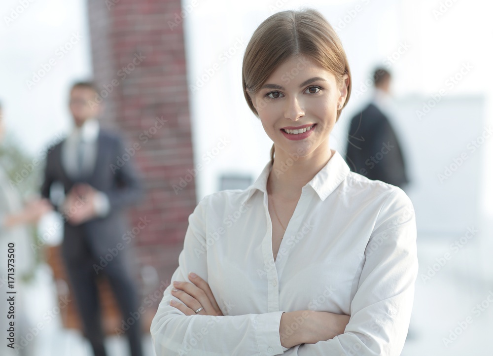 portrait of young business woman on the background of the office portrait of young business woman on the background of the office