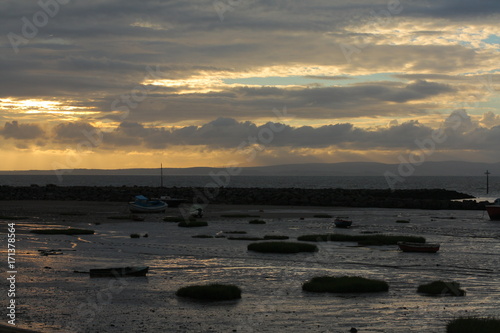 Stranded boats in Morecambe Bay at low tide
