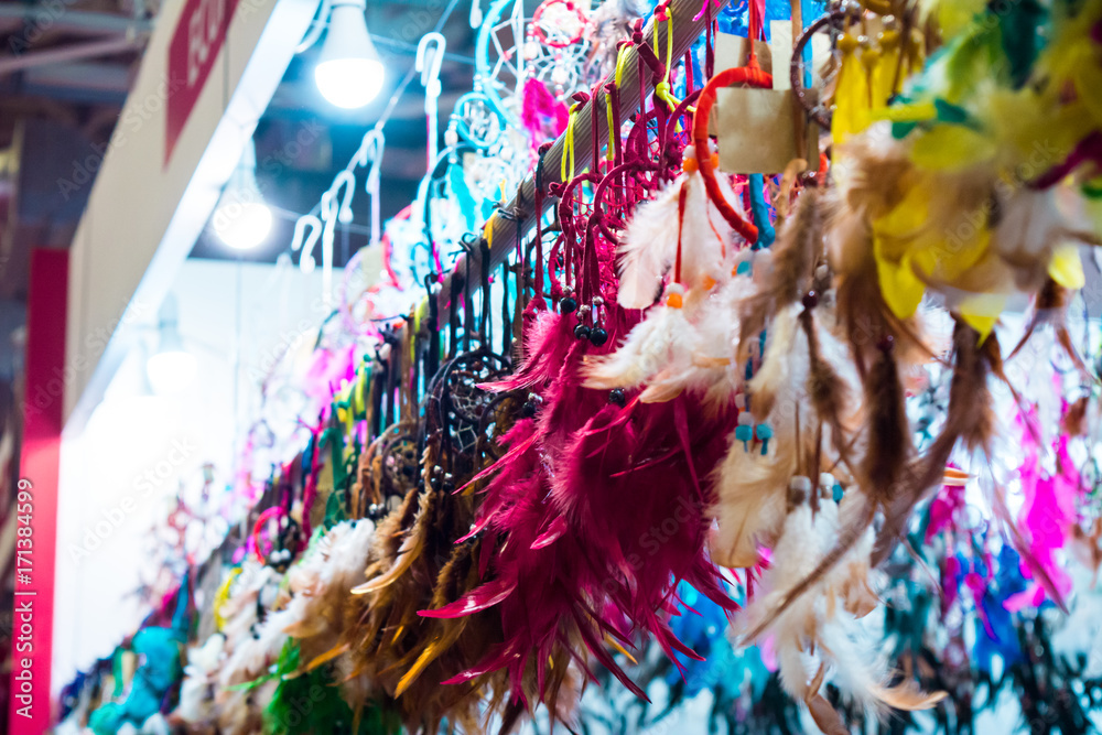 Fototapeta premium colored dreamcatchers at the market