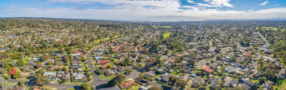 Aerial panorama of suburbia in Australia on bright sunny day