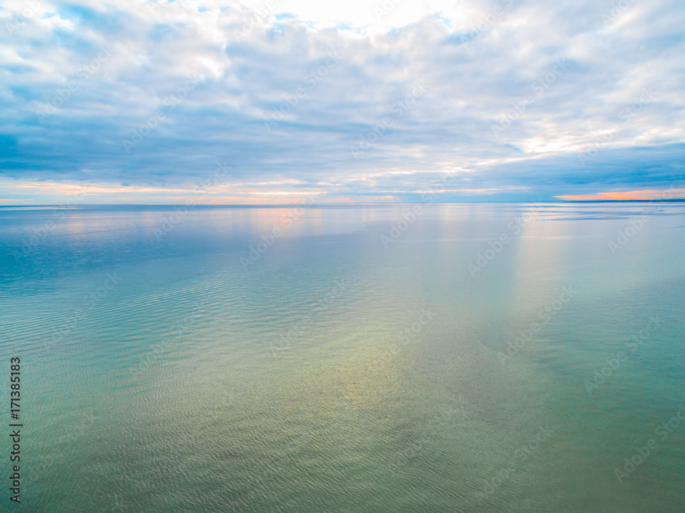 Aerial view of ocean water and sky