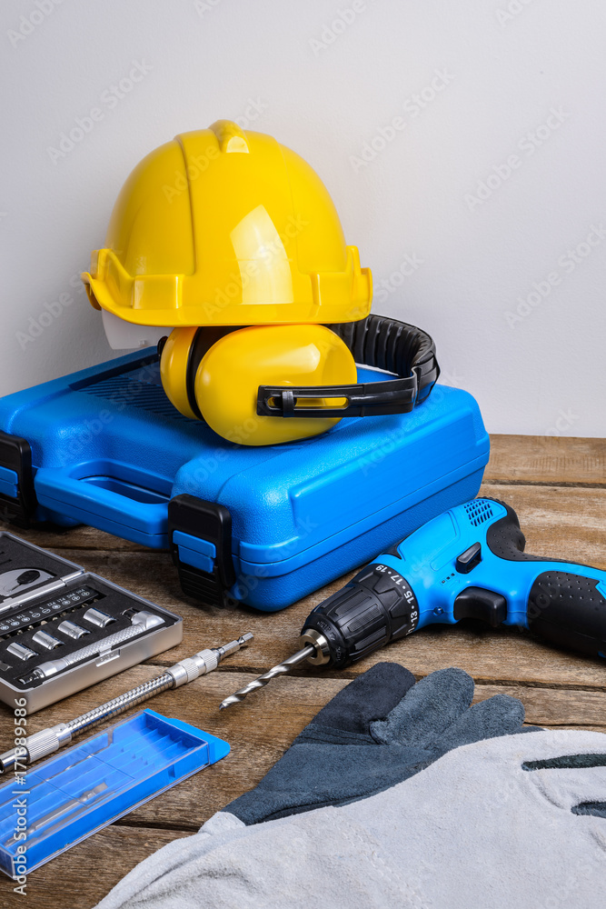 Obraz premium Drill and set of drill,tools,carpenter and safety, Protection Equipment