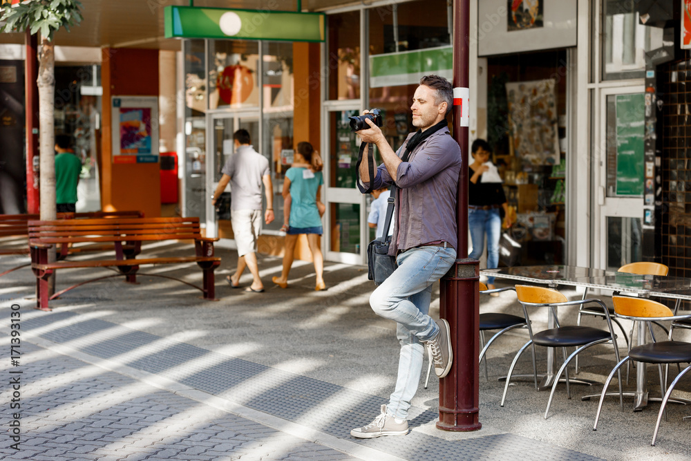 Male photographer taking picture Male photographer taking picture