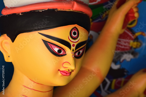 Goddess idols are being prepared with clay before festival. Idols being made for Durga Puja festival. Sculpture of goddess durga. 