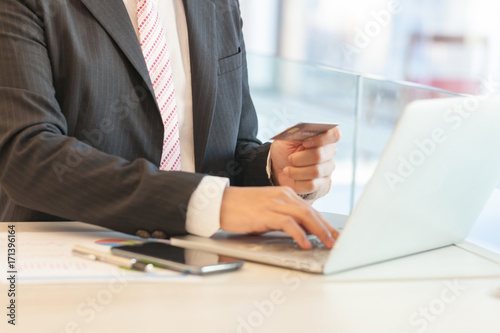 Businessman doing online banking.