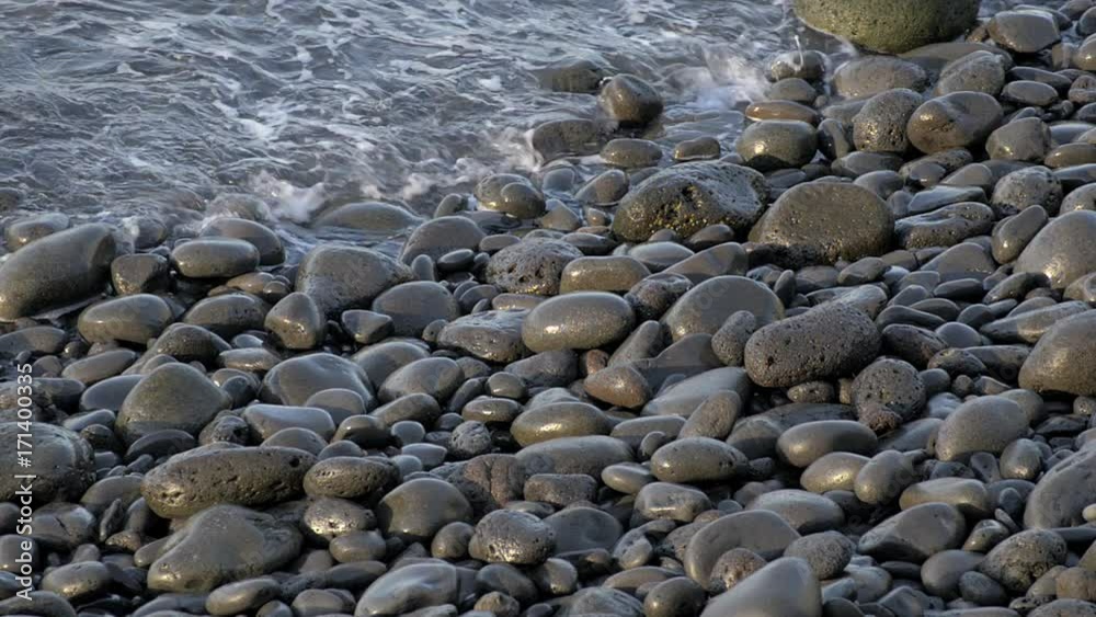 Sea wave incident on the coastal shingle. Sea wave incident on the coastal shingle.