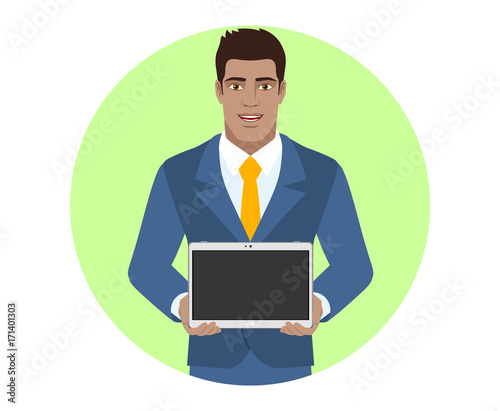 Businessman showing blank digital tablet PC