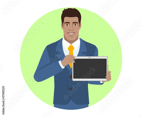 Businessman showing blank digital tablet PC