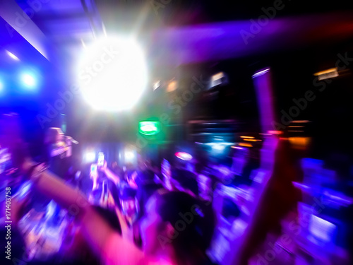 The live music Room39 scene of the pop band is very popular with the audience. Concert pictures at night time. Abstract photo blur