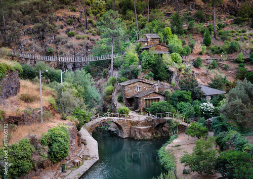 Stone houses of the village Foz de Egua, Portugal photo