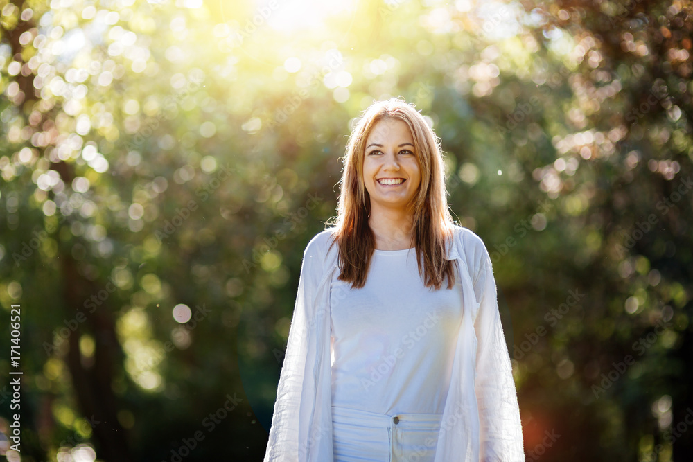 Beautiful brunette in nature