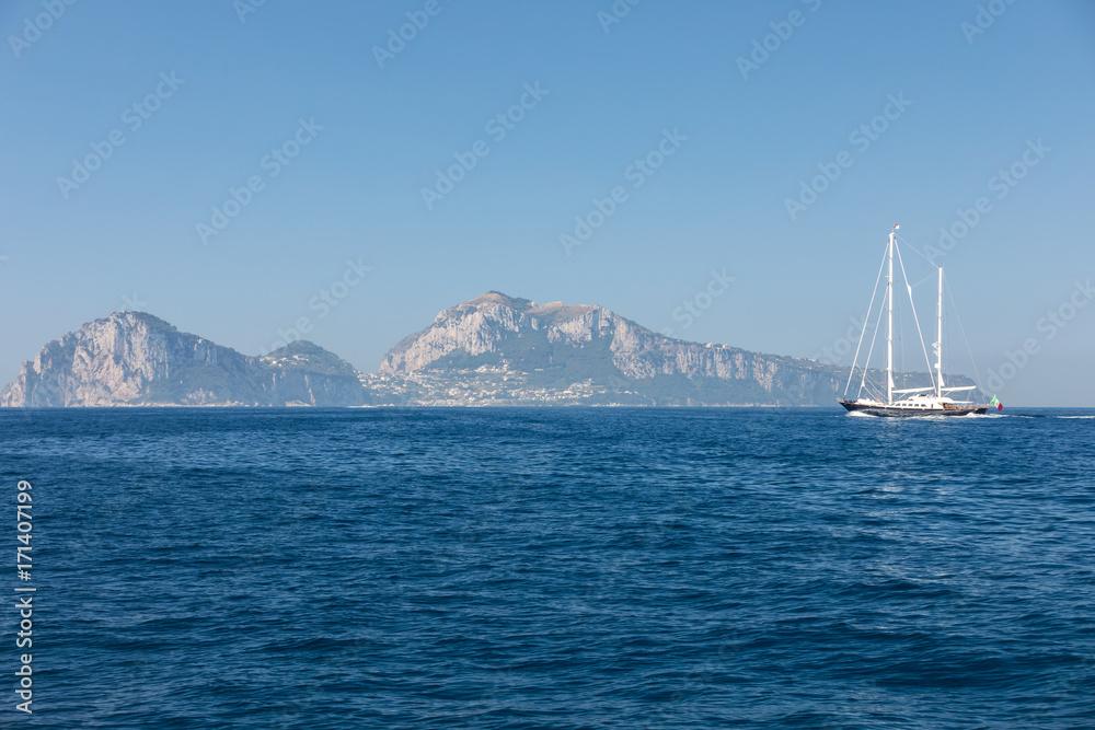 The Island of Capri is a very picturesque, luxuriant and extraordinary location in Italy famous for its high rocks.