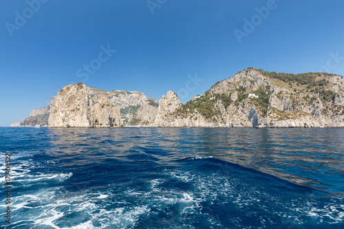 View from the boat on the cliff coast of Capri Island, Italy