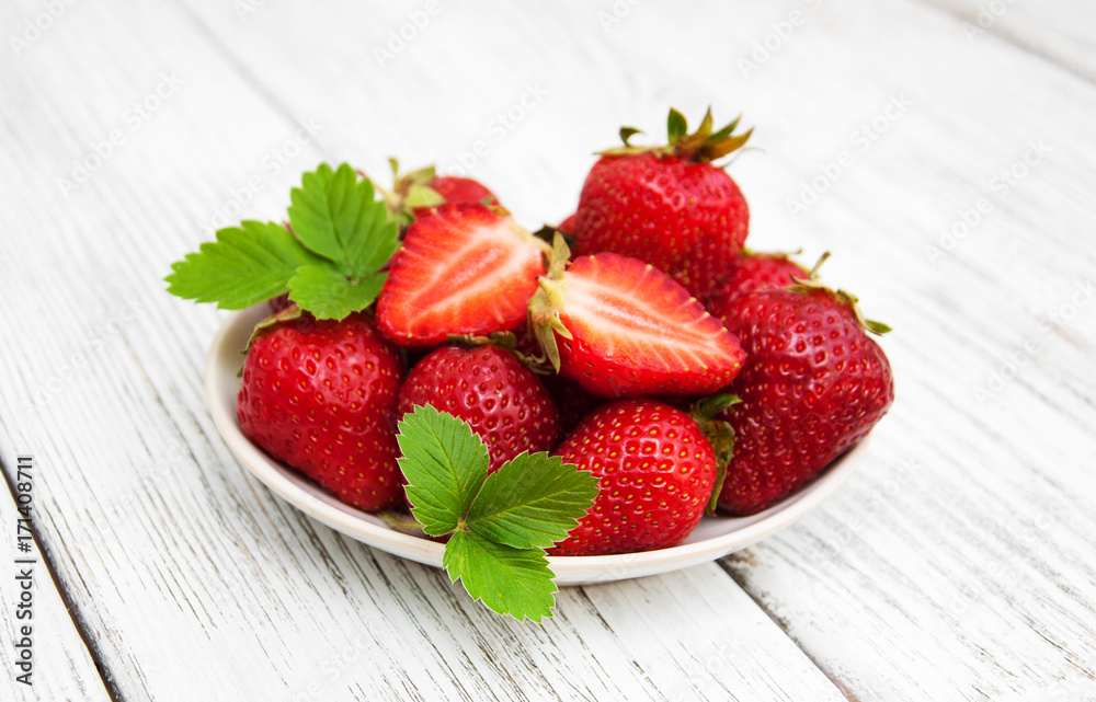 ripe strawberries on wooden table ripe strawberries on wooden table