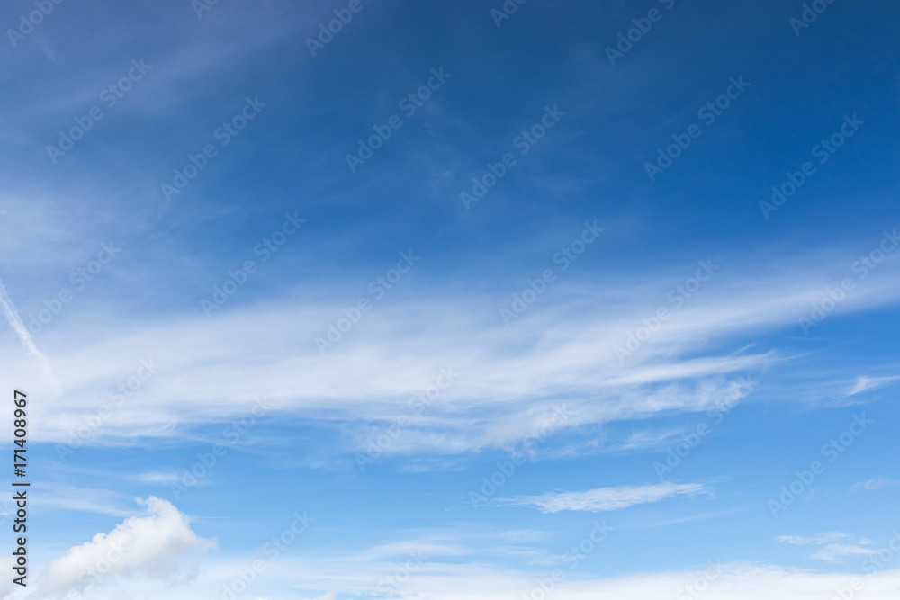 White fluffy clouds in the blue sky