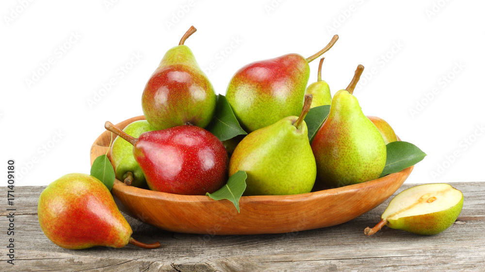 pear with leaf on old wooden table with white background pear with leaf on old wooden table with white background