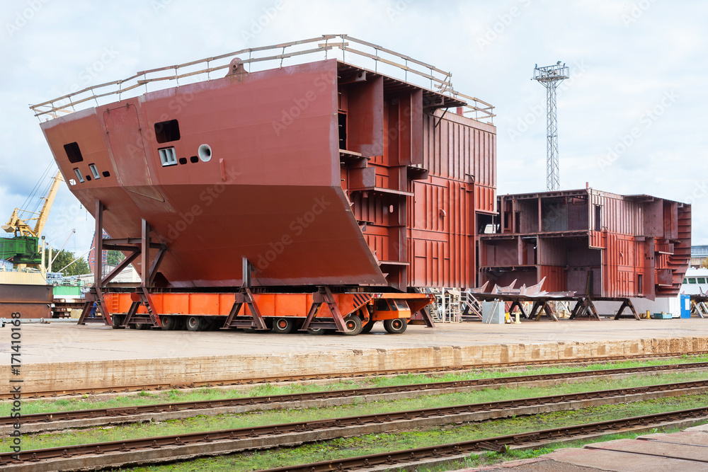 Construction on a dry dock in a shipyard Construction on a dry dock in a shipyard