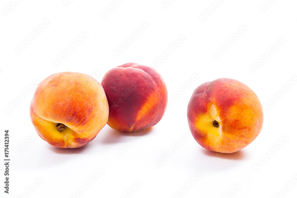 Group of ripe peach fruit isolated on white background.