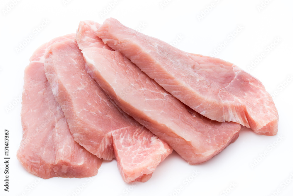 Fresh pork fillet with basil on a white background. Fresh pork fillet with basil on a white background.