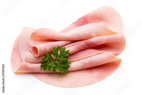 Sliced boiled ham sausage isolated on white background, top view.