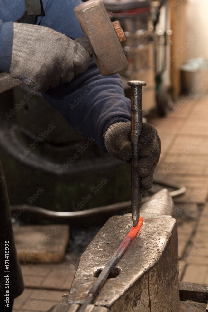 Making the horseshoe from heated red rod Making the horseshoe from heated red rod